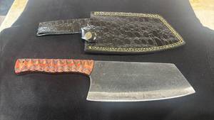 lot 40 image: Chefs Knife with Orange Patterned Handle and Sheath