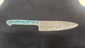 lot 67 image: Chefs Knife Damascus Pattern Blade Blue and Brass Handle