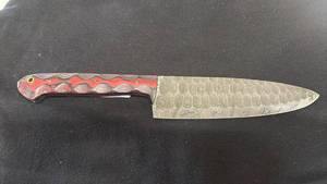 lot 72 image: Chef Knife Patterned Blade Red Handle