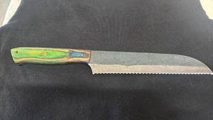 lot 73 image: Serrated Bread Knife with Multicolor Handle