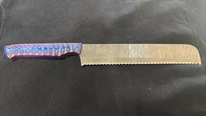 lot 78 image: Serrated Bread Knife with Colorful Handle