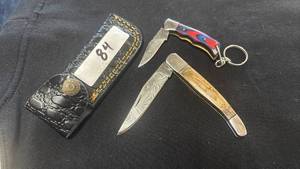 lot 84 image: 2 Folding Pocket Knives with Damascus Blades and Decorative Handles