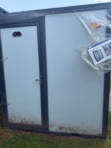 lot 8281 image: Unused SD Lanch Mobile Toilet (IRMT, SN 20260085) - Does have some Damage - Please see pics