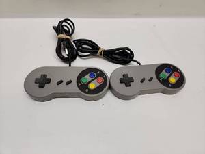 lot 12 image: 2x Super Nintendo SNES Controller Pair with Cables