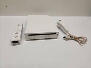 lot 34 image: Nintendo Wii Console with Remote, Nunchuk, and Accessories