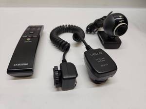lot 45 image: Samsung Smart Hub Remote with Vello ETTLCord Canon OCS-C3 Camera Accessories