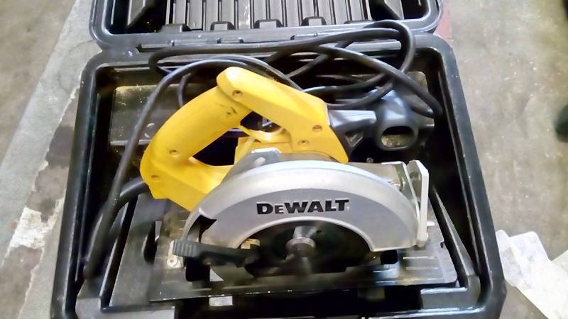 lot 6316 image: DEWALT 15-Amp Corded Circular Saw with Steel Shoe