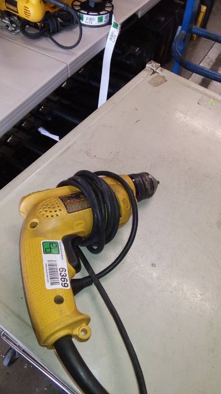 lot 6369 image: 6.7 Amp 38 in. Variable Speed Reversing Drill with Keyless Chuck