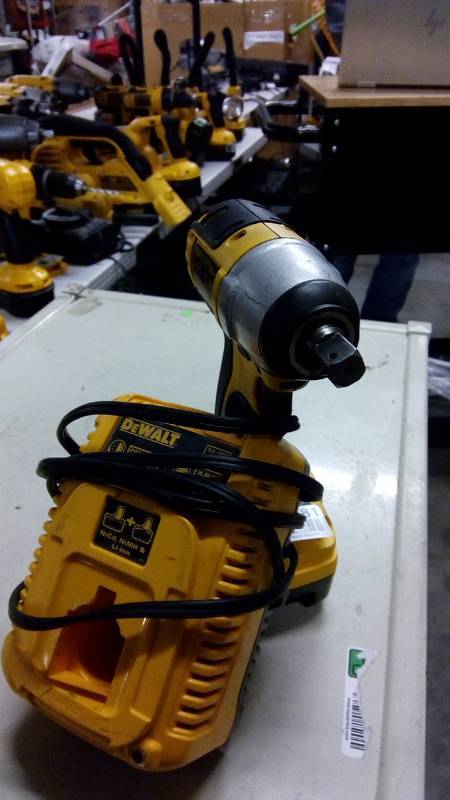 lot 6481 image: 12 (13mm) 18V Cordless Impact Wrench. Battery And Charger Included.