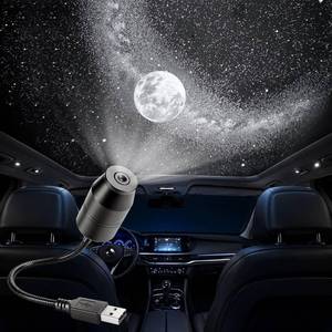 lot 2185 image: USB Galaxy Projector Night Light, 360°Rotation Night Light Star Projector with Romantic Atmosphere, Portable Mini Star Roof Lights for Car Bedroom Decor (Starry Sky & Moon)