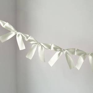 lot 2247 image: Eanjia Bow Knot Garland  6ft Linking Satin Bow Banner with 3ft Extend Ribbon for Coquette Bachelorette Party, Baby Shower,Bridal Shower Wedding Baby Room Bed Decor (Ivory, 6ft)