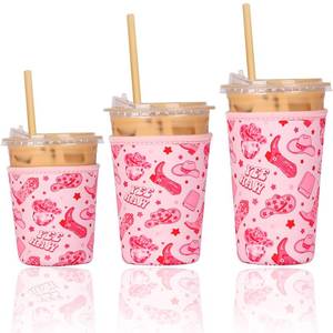 lot 2266 image: Reusable Insulated Neoprene Iced Coffee Cup Sleeve, Durable Drink Sleeve for Cold Beverages, Beverage Holder for Iced Coffee (Pink Cowgirl)