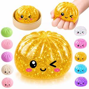 lot 14391 image: Mystery Glitter Dumpling Squishy Pack with Steamer Box � Soft Bao Bun Stress Ball, Sensory Fidget Squeeze Toy for Stress and Anxiety Relief, Stretchy Desk Toy Gift for Kids, Teens and Adults, Glitter Gold