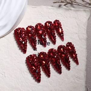 lot 6285 image: Long Almond Press on Nails Handmade Fake Nails Sparkly Red Rhinestones Full Cover False Nails with Designs Luxury Reusable Stick on Nail for Women 10Pcs(Size M)