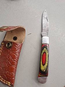 lot 18132 image: MHSCutlery Handcrafted Folding Knife Damascus Steel Blade Red Yellow Black Handle with Leather Sheath,  6 Inch