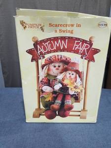 lot 1928 image: Pumpkin Patch Scarecrow in a Swing Autumn Fair Decorative Figurine