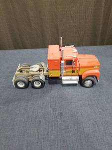 lot 1951 image: Semi Truck Model Orange and Yellow Cab