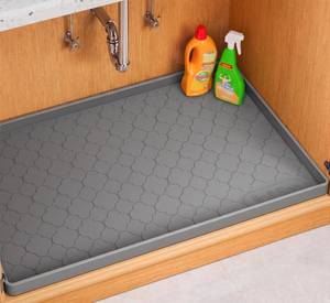 lot 73508 image: Waterproof Under Sink Mat 22 x 19, Thick Silicone Mat Cabinet Protector for Kitchen and Bathroom, Shelf Liner, Home Organizer and Storage, Multipurpose Tray for Gadgets and Essentials - Retail $22