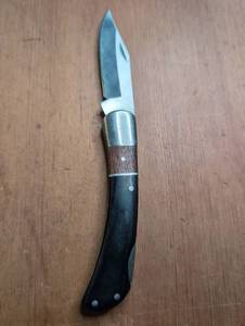 lot 1508 image: Folding Pocket Knife with Wood and Metal Handle