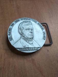 lot 1701 image: John Deere Belt Buckle He Gave to the World the Steel Plow Serial No. 19
