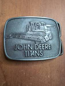 lot 1703 image: John Deere Titans Belt Buckle