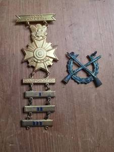 lot 2004 image: U.S. Military Junior Sharpshooter Medal with Bars  Crossed Rifles Insignia