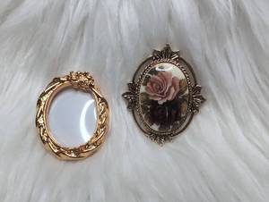 lot 3100 image: Sara Coventry Oval Brooch  Ornamental Frame Pin