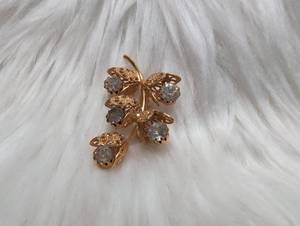lot 3101 image: Gold-Tone Floral Brooch with Clear Rhinestones