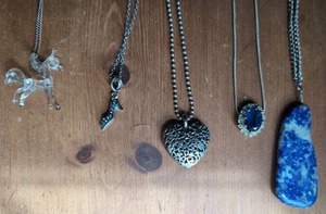 lot 3403 image: Pendant Necklace Lot Glass Unicorn, Blue Stone, Heart and Metal Charms - 5 ct