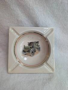 lot 1706 image: AC Spark Plugs Coralox Insulator Ashtray Cadillac 1904
