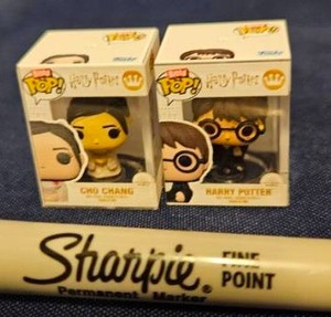 lot 220 image: Bitty Funko Pop Harry Potter Cho Chang and Harry Potter Figures 2-Pack