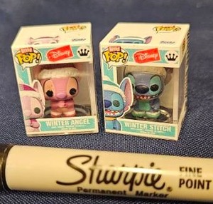 lot 221 image: Bitty Funko Pop Disney Lilo &amp Stitch Winter Angel and Winter Stitch 2-Pack