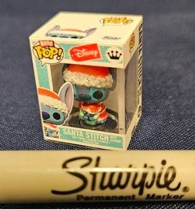 lot 223 image: Bitty Funko Pop Disney Santa Stitch Vinyl Figure