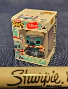 lot 225 image: Bitty Funko Pop Disney Stitch with Candy Cane