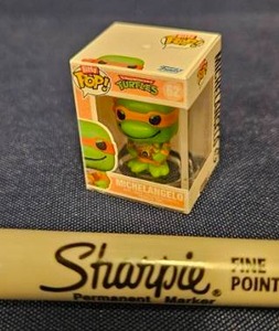 lot 235 image: Bitty Funko Pop Teenage Mutant Ninja Turtles Michelangelo #62