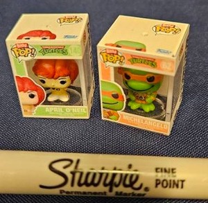 lot 238 image: Bitty Funko Pop Teenage Mutant Ninja Turtles April ONeil Michelangelo 2-Pack