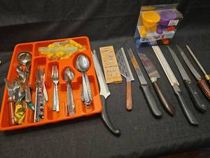 lot 1325 image: Kitchen Utensil and Knife Lot with Orange Tray, Silicone Baking Cups, and Accessories