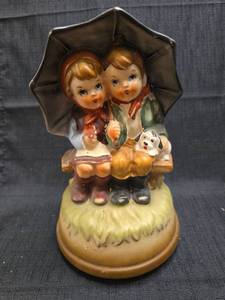 lot 1339 image: Hummel Figurine Two Children Umbrella Dog Decorative Collectible music box