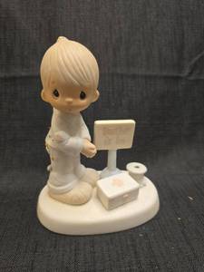 lot 1344 image: Precious Moments Doctor is In Figurine with Sign and Stethoscope