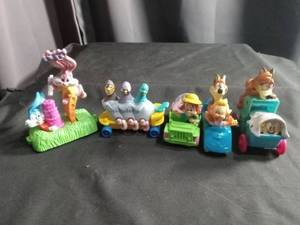 lot 6829 image: Toy Figurine Collection Lot 5 Pieces Cartoon Characters Vehicles Tiny Toon Adventures