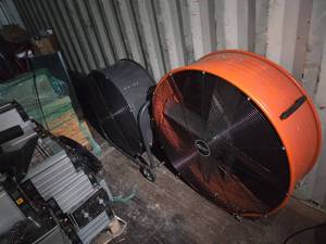 lot 2021 image: Two Industrial Portable Barrel Fans