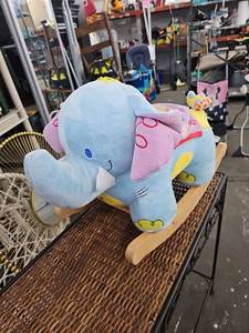 lot 62607 image: Rockabye Elijah Elephant musical rocking toy