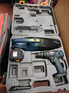 lot 63268 image: Ryobi Cordless Drill Driver and Hand Vacuum Set