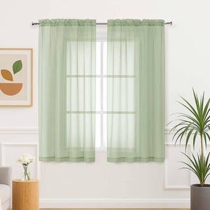 lot 836 image: Aiyufeng Light Green Sheer Curtains 63 Inch Length 2 Panels Set for Living Room, Light Filtering Green Window Sheers Drapes for Bedroom, Each 42 W x 63 L - Retail $8