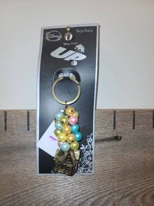 lot 10 image: Disney Pixar Up Keychain with Beaded House Charm