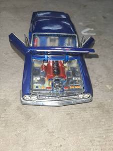 lot 25 image: Die-Cast Vehicle with Opening Hood