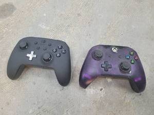 lot 44 image: Nintendo Switch Pro Controller Lot of 2