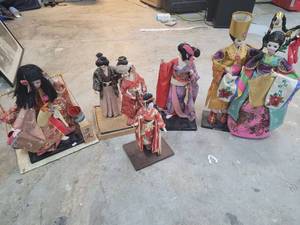 lot 77 image: Lot of 9 Asian-Style Dolls with Traditional Costumes and Stands
