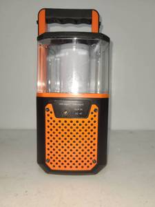 lot 137 image: Portable LED Lantern Speaker Orange Black USB AUX DC Input