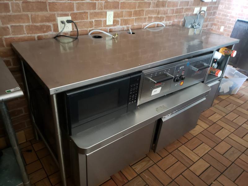 lot 3013 image: All stainless work top table with storage cabinets on right side